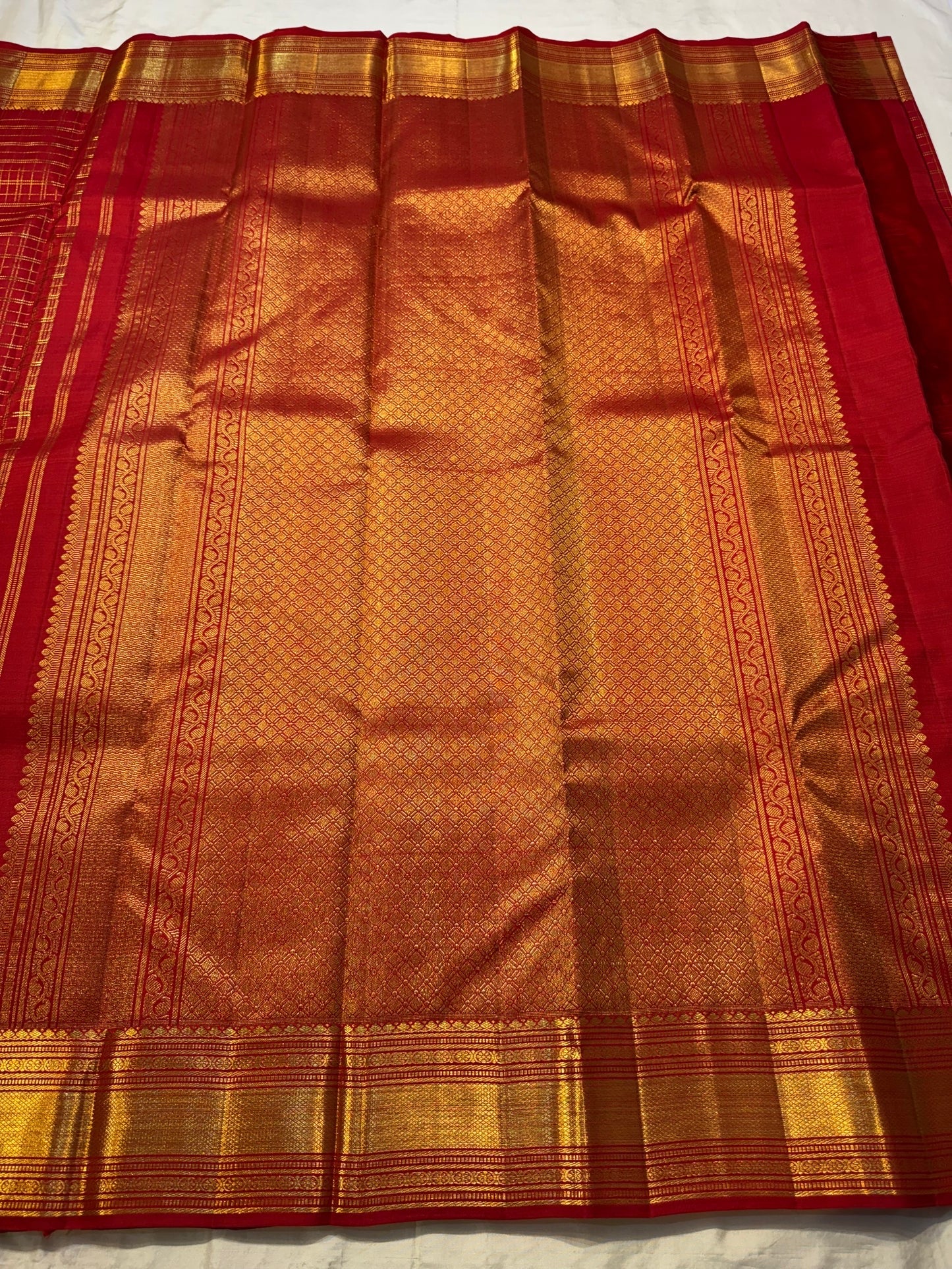 Pure Kanchipuram silk saree with structured antique gold kattam grid and zari border