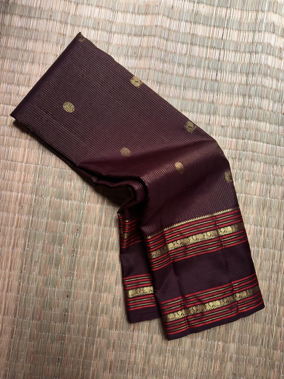Handwoven Deep Kaapi Maroon Kanchipuram silk saree, body detail, Mayil Chakram zari medallions