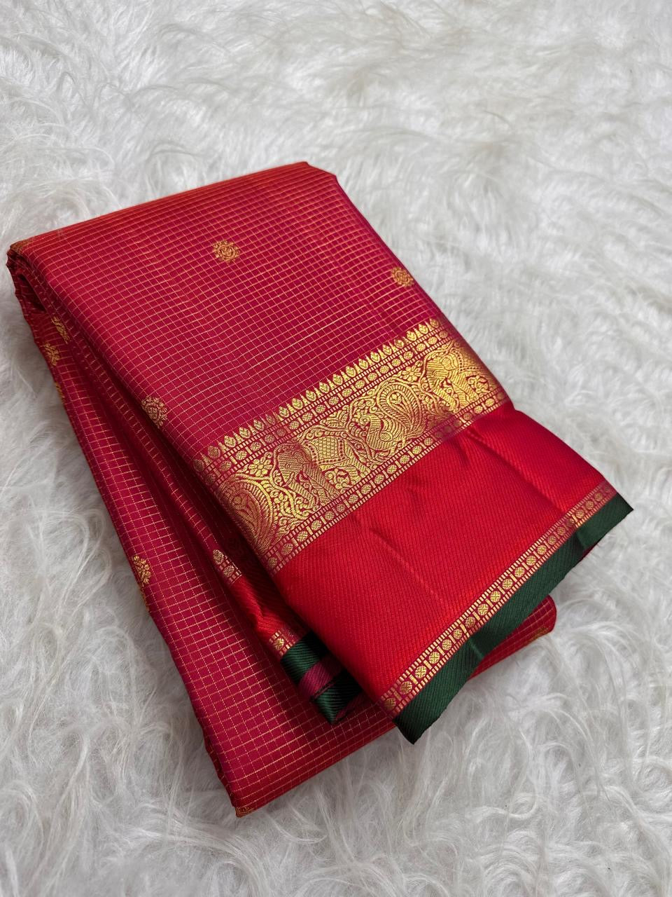 Detailed view of Rudraksham motifs in a handwoven Kanchipuram silk saree border.