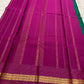 Emerald Green and Vadamalli Magenta lightweight Kanchipuram silk saree, spaced buttas and scrolling floral zari border; border detail