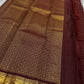 Elegant brown Kanjeevaram saree with antique gold zari kattam pattern
