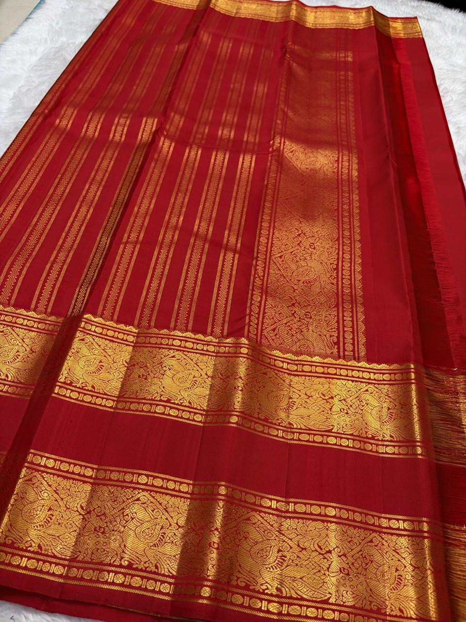 Kumkum Red and Antique Gold Handwoven Pure Silk Kanchipattu Saree with Rettapet Border and Mayil Chakram Butta