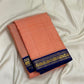 Traditional Kanchi Kattam Kanjeevaram saree with royal blue border, close-up