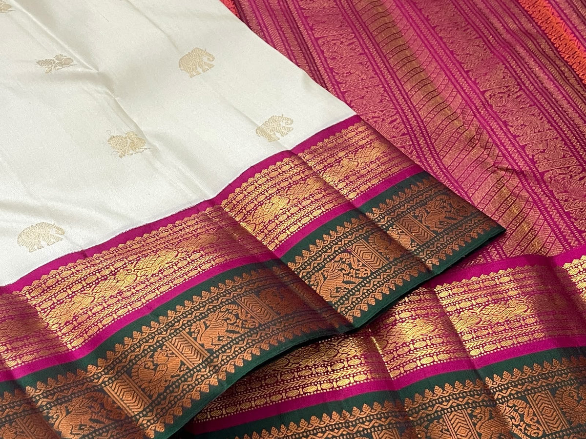 Sandalwood Ivory Handwoven Pure Silk Kanjivaram Korvai Saree with Peacock and Elephant Motifs, body and border detail