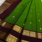 Traditional parrot green Kancheepuram silk saree with deep coffee brown rettapet border Idam Living