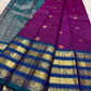 Vadamalli magenta silk body with fine gold oosivaanam stripes and spaced gold circular buttas