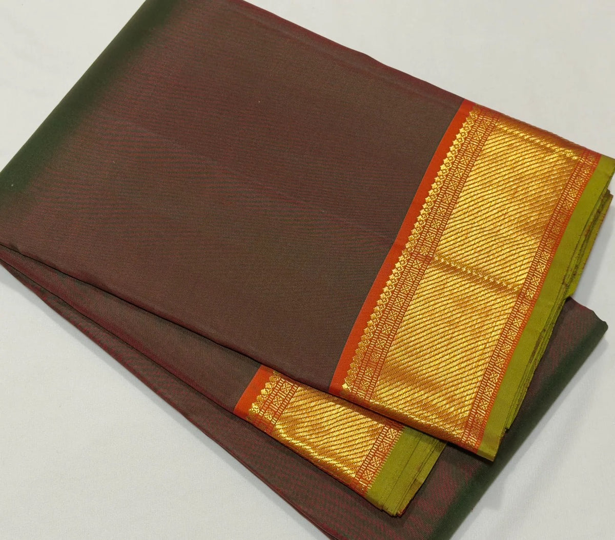 Manthulir green and kesari orange handwoven pure silk Kancheepuram saree with bawanchi borders, view 2