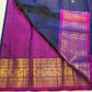 Traditional royal blue and magenta Kanchipuram silk saree with Rettapet weave and Mayil butta