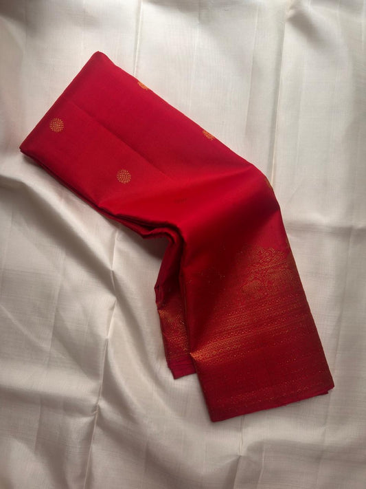 Traditional rani pink pure silk Kanjivaram saree with woven zari buttas