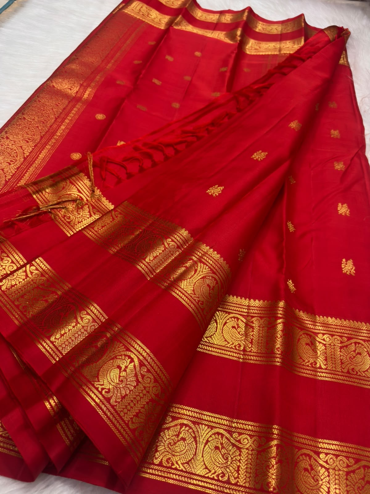 Traditional Rettapet Kanchipuram saree with Yazhi motifs in vermilion red