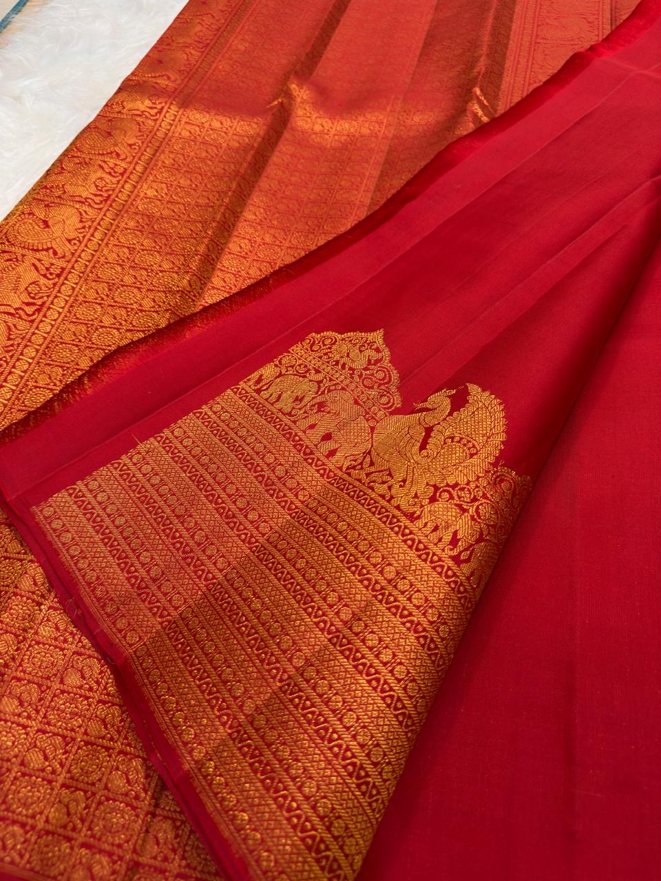Traditional ruby red Kanjipuram silk saree, full drape
