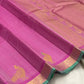 Mint green selvedge and pale gold zari border on an orchid pink Vairaoosi Kanchipuram saree