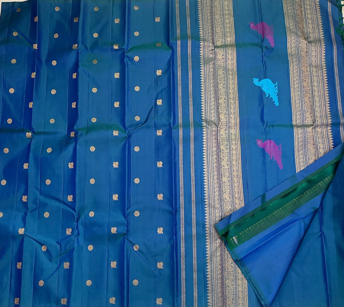 Peacock blue pure silk Kanjivaram saree with Mayil Kamalam buttas, folded view — Idam Living