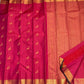 Traditional gold zari pallu on a deep pink magenta Kanjivaram silk saree