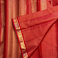 Fine parallel Vairaoosi stripes visible in the red silk body beside small paisley zari buttas