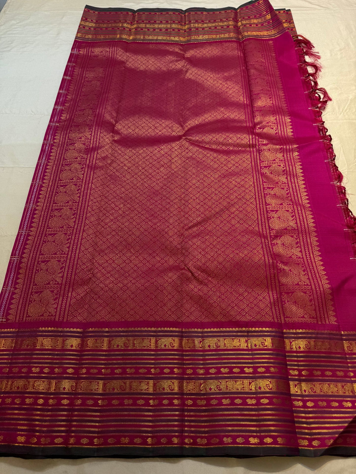 Varisaipet border on Rani Pink Kanjivaram saree