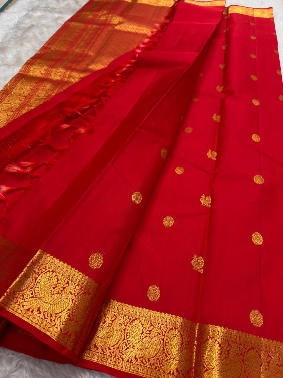 Traditional zari Kanchipuram saree with peacock mayil border – pallu detail