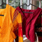 Handcrafted yellow designer blouse with ikkat weaving and layered zari accents