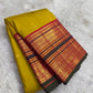 Turmeric Gold Kanjivaram silk saree with raspberry Korvai elephant zari border — Idam Living