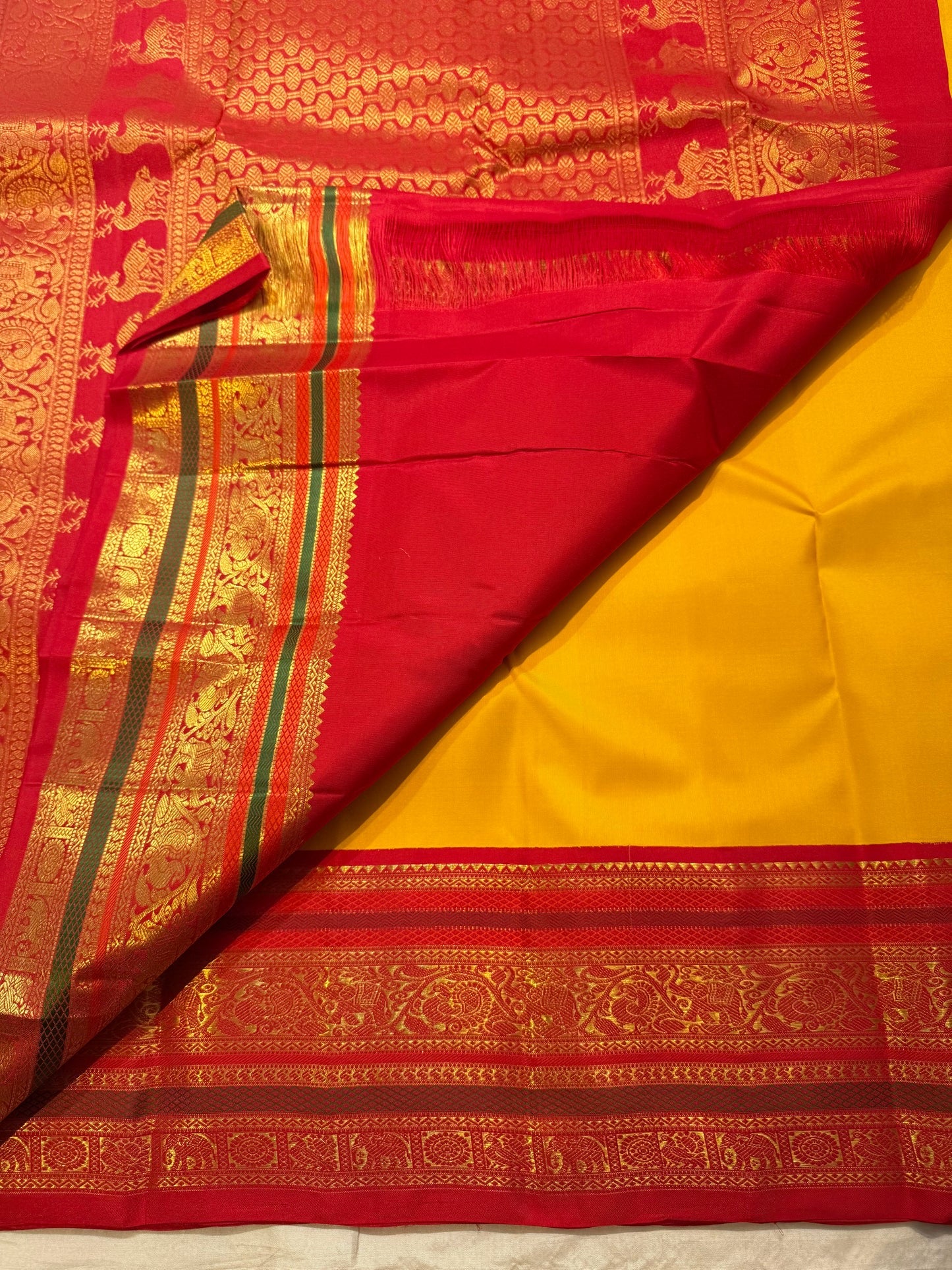 Turmeric Yellow Handwoven Pure Silk Kanjeevaram Saree with Kumkum Red Korvai Zari Border