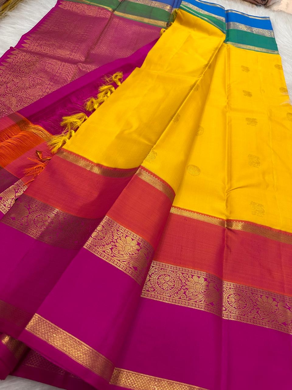 Turmeric Marigold Handwoven Pure Silk Kanchipuram Saree with Varnajaalam Multicolour Border
