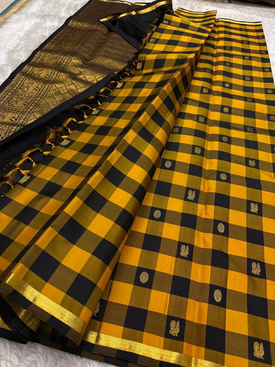 Handwoven Kanchipuram silk saree with classic yellow and black checker pattern