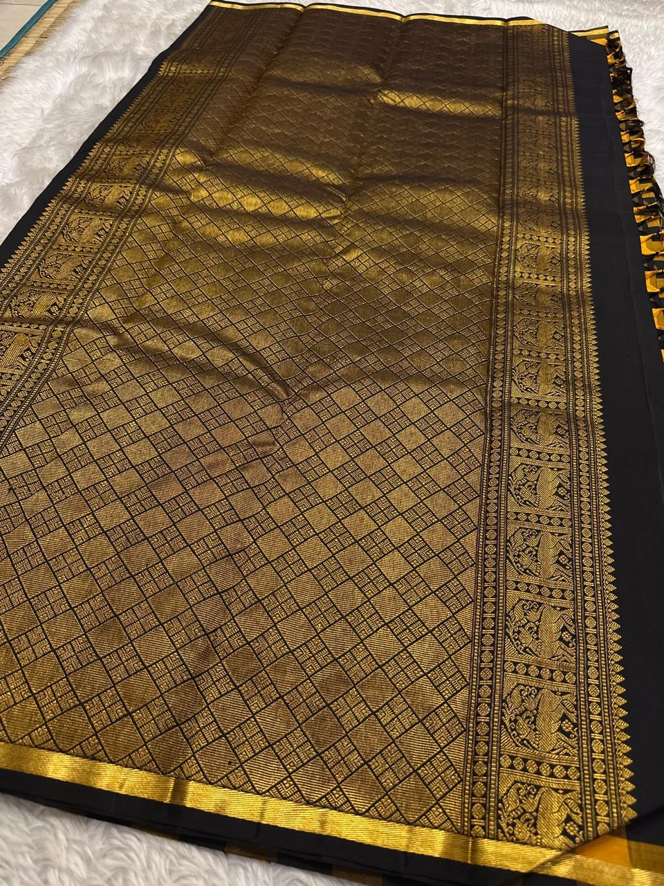 Close view of precision-woven checks on Pure Silk Kanchipuram saree