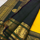 Deep green Kanchipuram border with large paired Mayil peacock medallions in gold zari.