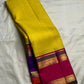 Turmeric Yellow pure silk Kanjivaram Rettapet saree with Ganga Jamuna Royal Purple and Rani Pink borders.