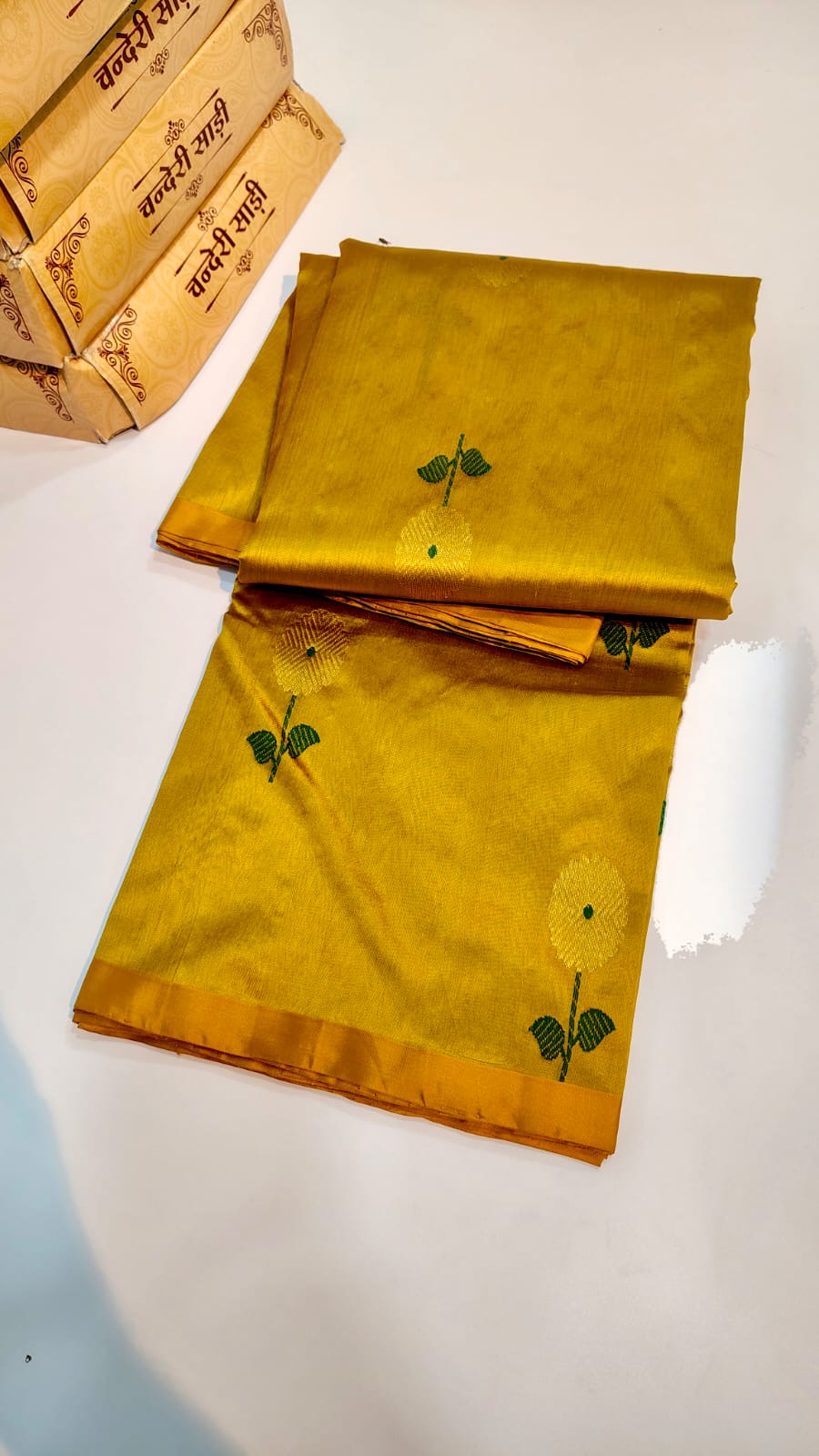 Manjal Pattu Silk Chanderi saree with woven flower motifs