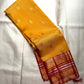 Turmeric Yellow Kanchipuram saree with Arakku Red Kanchi Pettu gold zari bands
