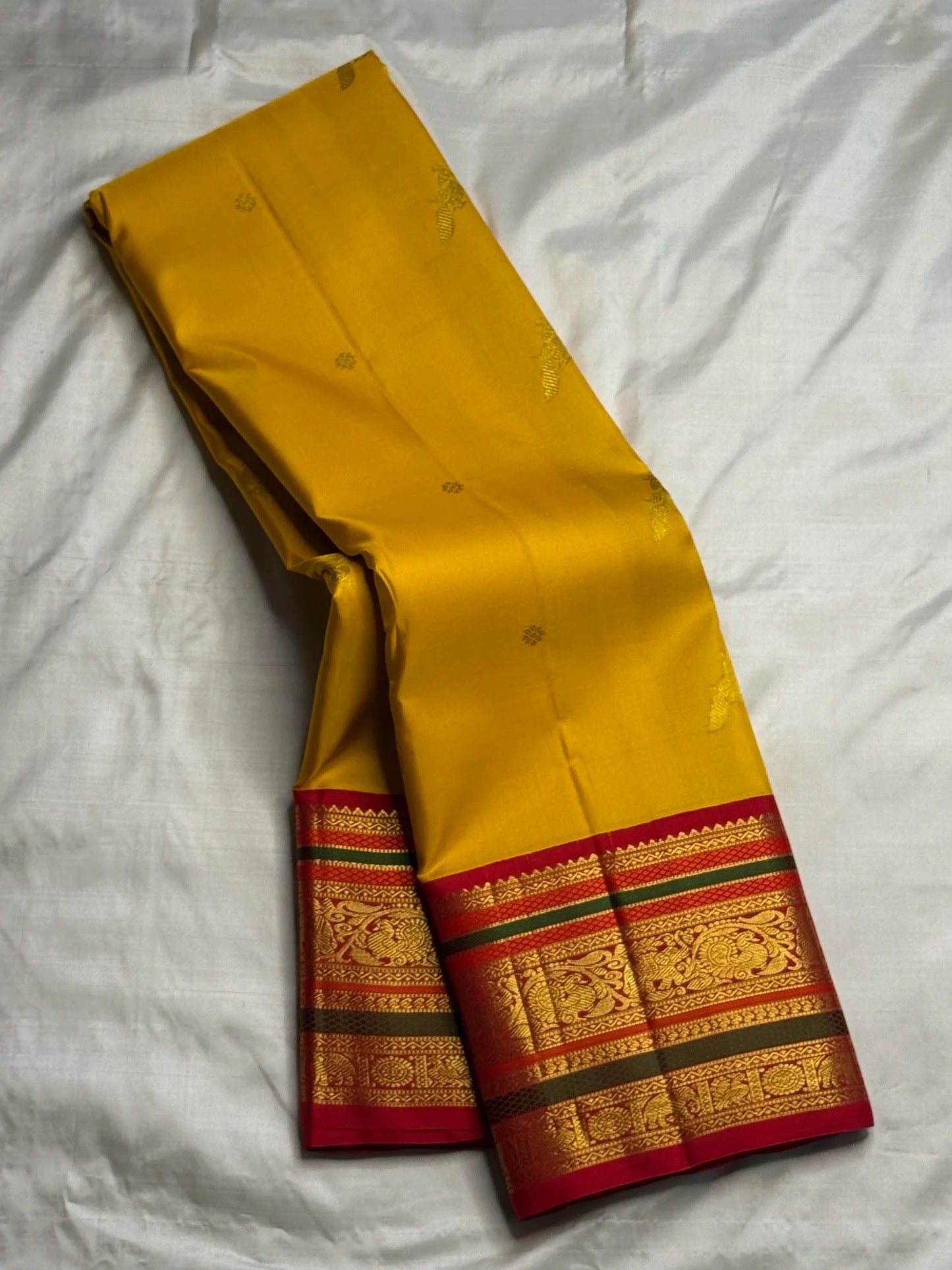 Turmeric Yellow Handwoven Pure Silk Kanjeevaram Saree with Kumkum Red Korvai Zari Border