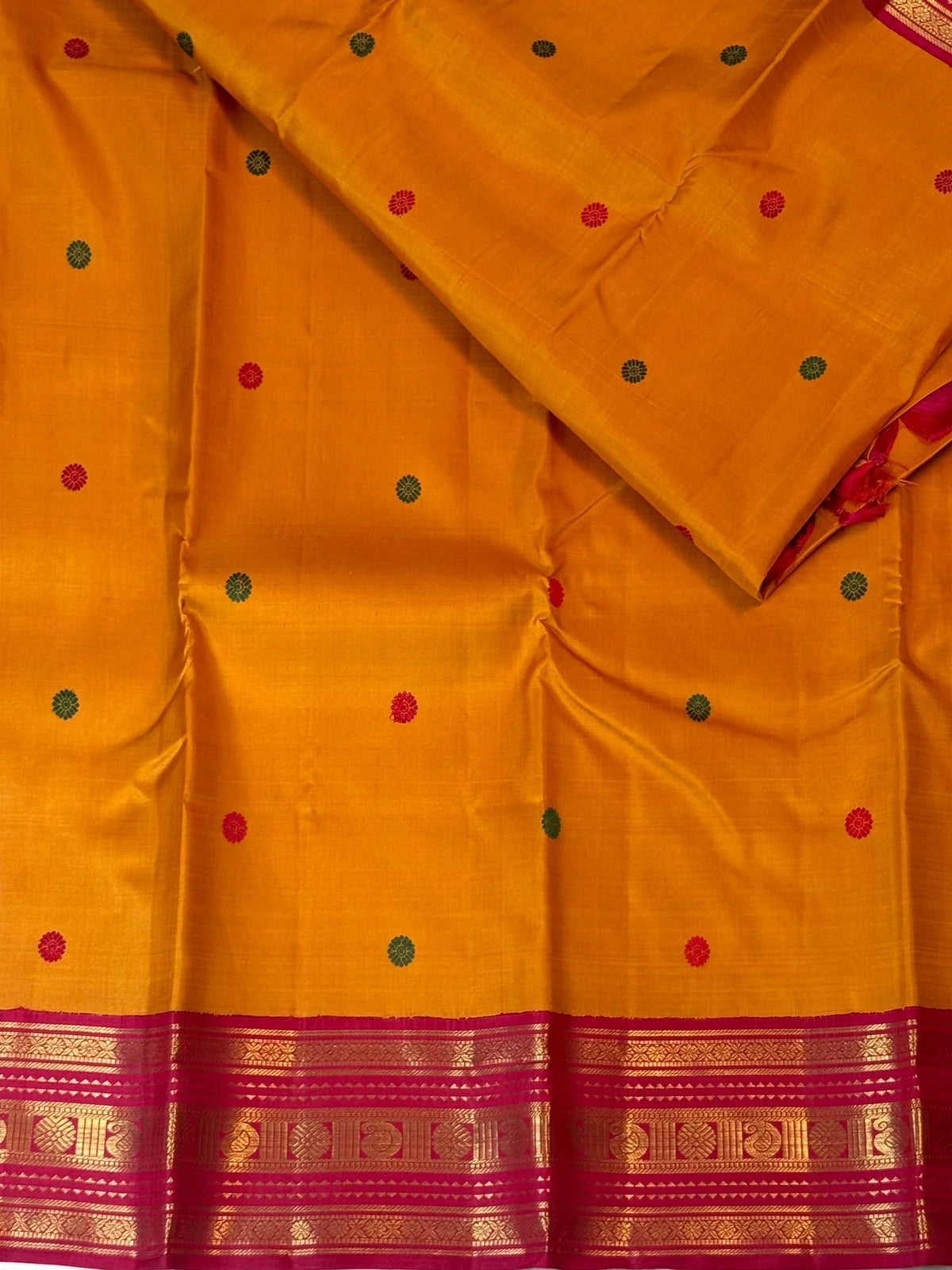 Turmeric yellow Kanchipuram pure silk saree with Maanga zari border