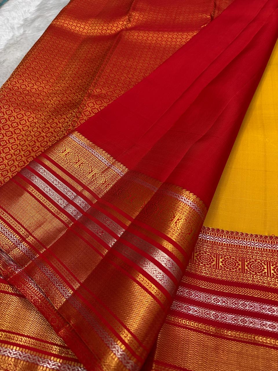 Turmeric Yellow Pure Silk Kanchipuram Varisaipet saree with Arakku Red thanga zari border