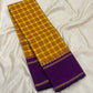 Turmeric Yellow Handwoven Pure Silk Kanchipuram Saree with Kanchi Kattam and Purple Rettapet Border, folded saree presentation