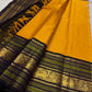 Turmeric yellow Kanjeevaram silk saree body with horizontal zari stripes