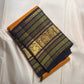 Turmeric yellow Kanjeevaram silk saree with deep navy zari pallu