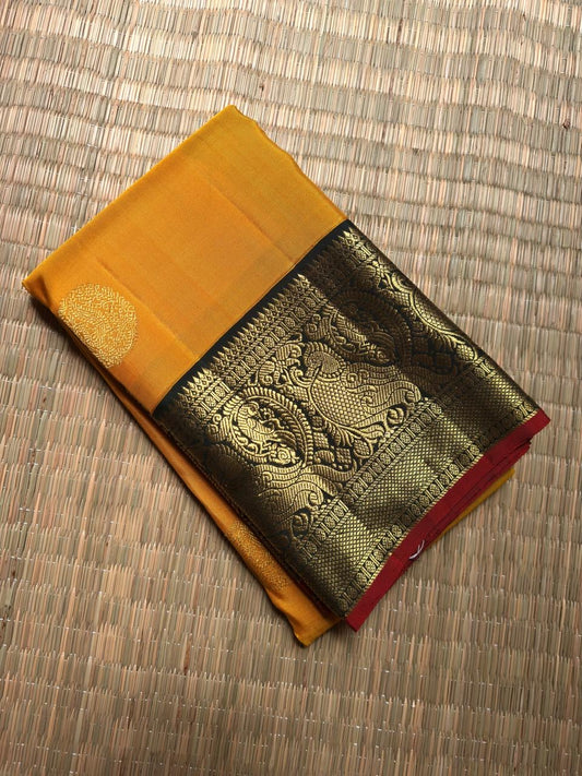 Turmeric Yellow Handwoven Pure Silk Kanjipuram Korvai Saree with Black Mayil Zari Border