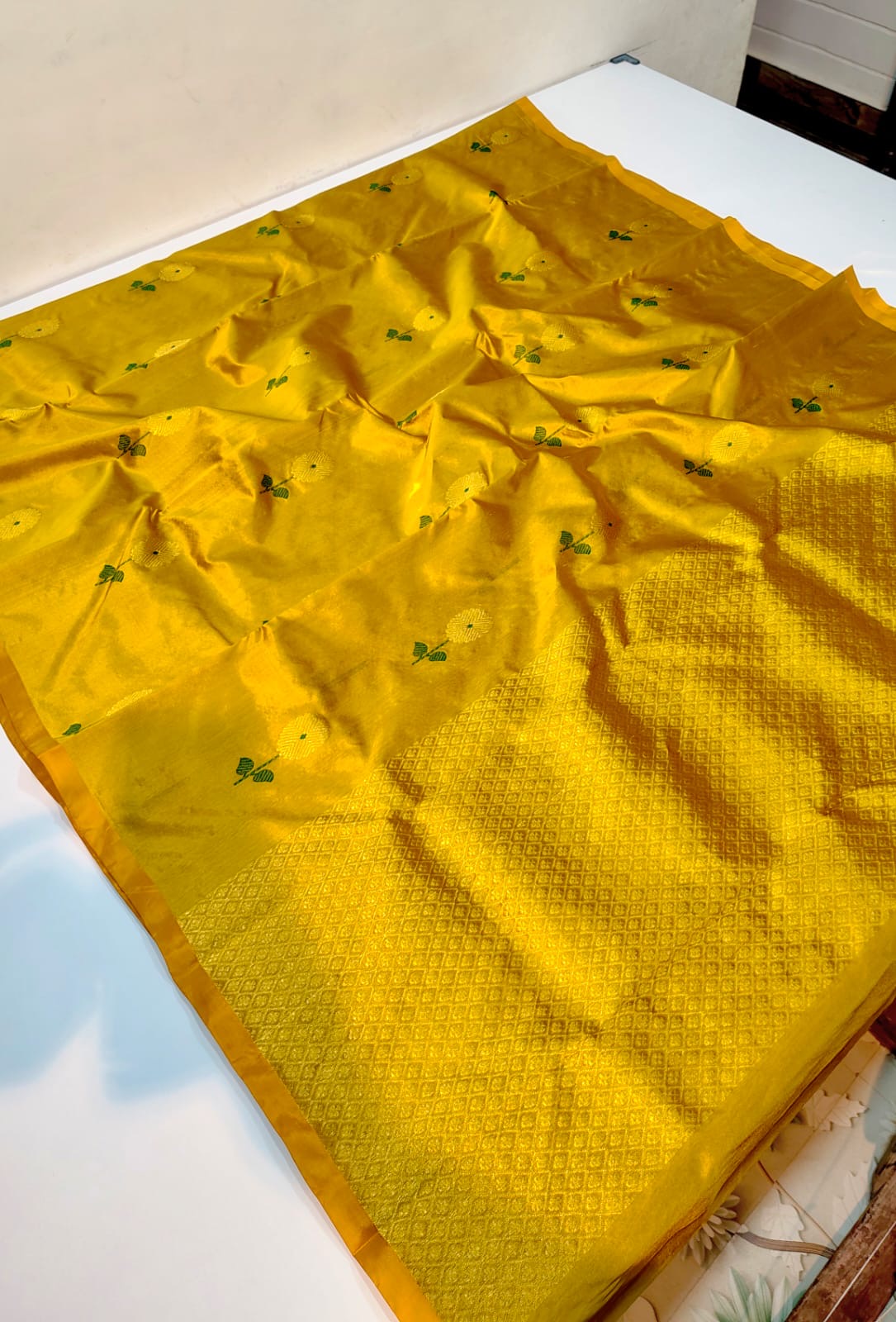 Turmeric yellow Pure Silk Chanderi saree with green floral butta