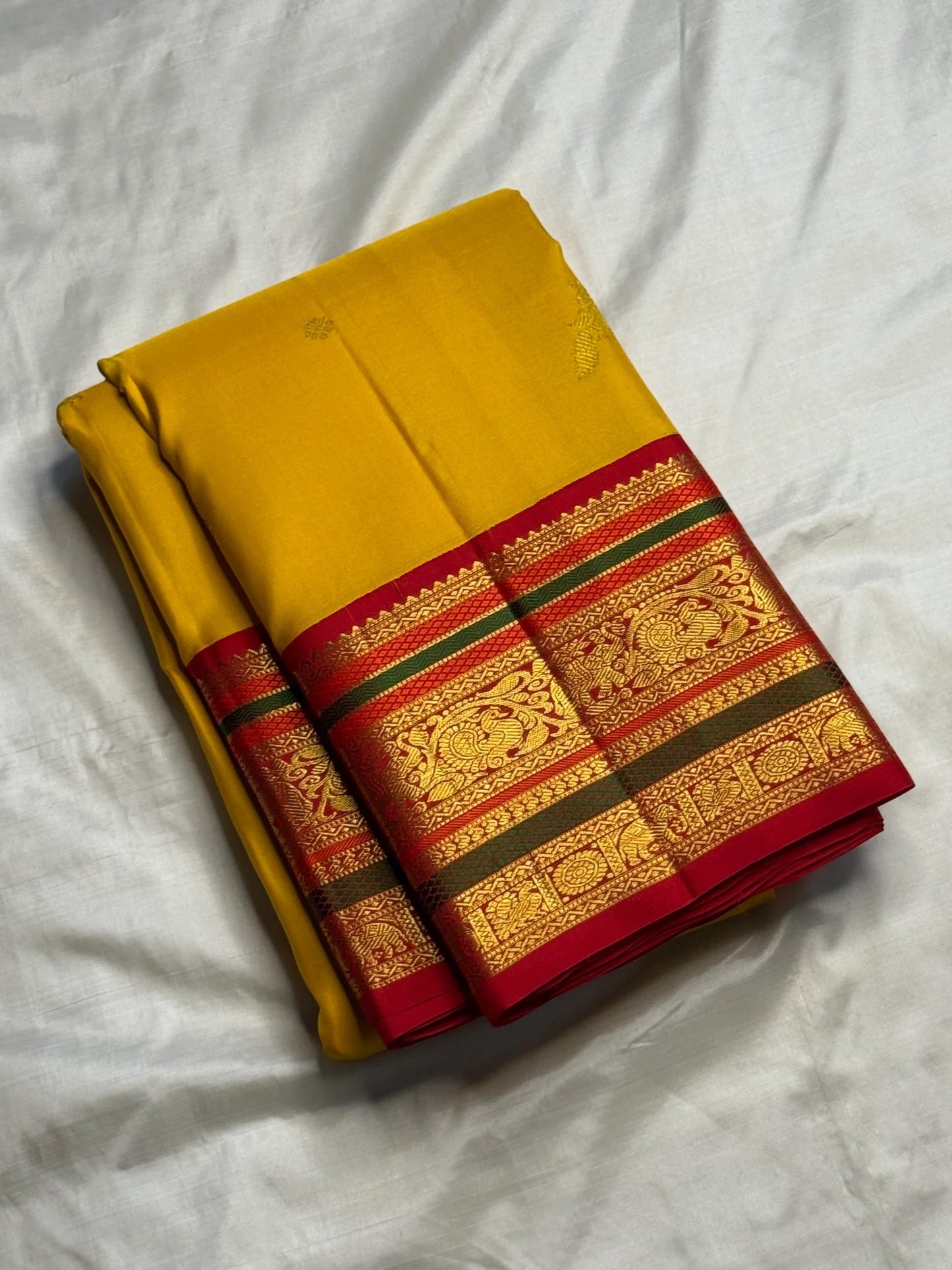 Turmeric Yellow Handwoven Pure Silk Kanjeevaram Saree with Kumkum Red Korvai Zari Border