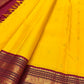 Curated Pure Silk Kanchipuram sarees including the Turmeric Yellow Korvai with deep Maroon border.