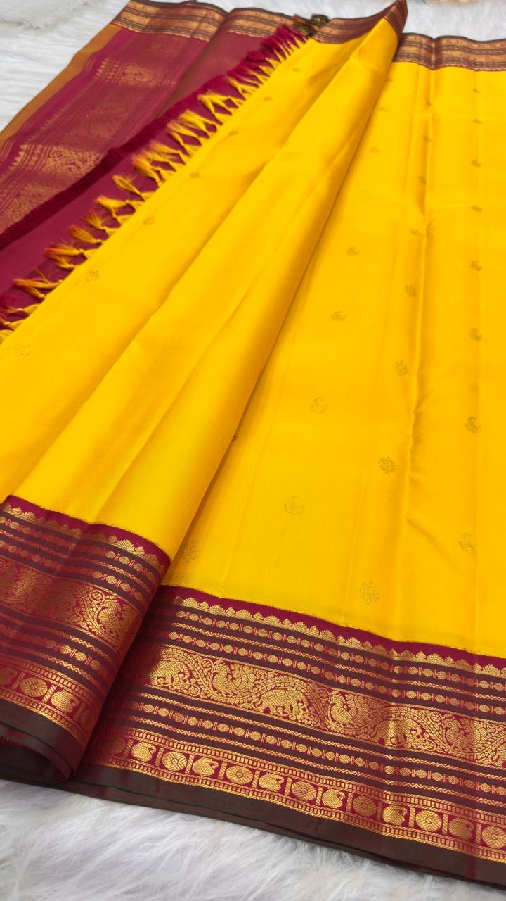 Curated Pure Silk Kanchipuram sarees including the Turmeric Yellow Korvai with deep Maroon border.