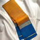 Turmeric Yellow Pure Silk Kanjivaram Rettapet saree with broad Royal Blue border