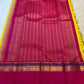 Turmeric Yellow pure mulberry silk saree with Rani Pink Ganga Jamuna border detail.