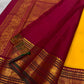 Turmeric-yellow body against Arakku red border, Kancheepuram Korvai saree