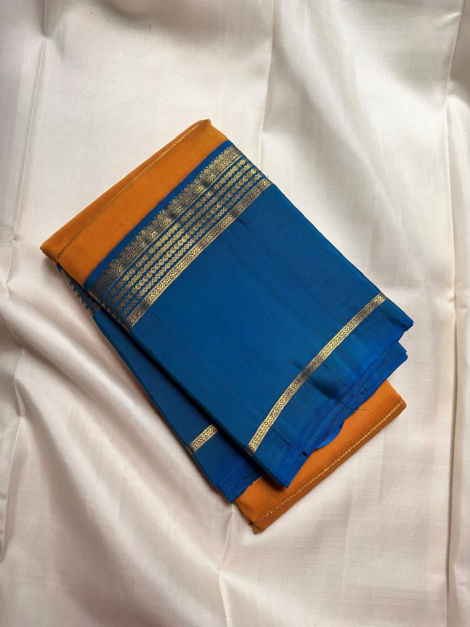 Handwoven yellow Kanchipuram silk saree with all-over antique gold zari Veldhari weave