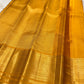 Traditional Turmeric Yellow Kanjivaram Butta saree with richly woven pallu.