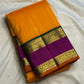 Turmeric Yellow silk saree with Magenta border and gold zari detail