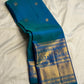 Close view of gold zari elephant motifs on the Varisaipet border.