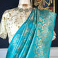 Handwoven raindrop buttas on Turquoise Blue Pure Katan Silk Banarasi saree